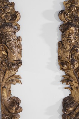Lot 121 - A pair of George II giltwood pier mirrors attributed to Matthias Lock