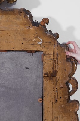 Lot 121 - A pair of George II giltwood pier mirrors attributed to Matthias Lock