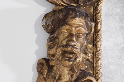 Lot 121 - A pair of George II giltwood pier mirrors attributed to Matthias Lock