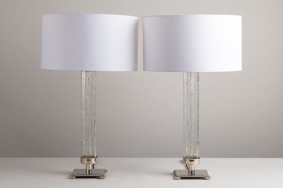 Lot 194 - A pair of clear moulded glass table lamps