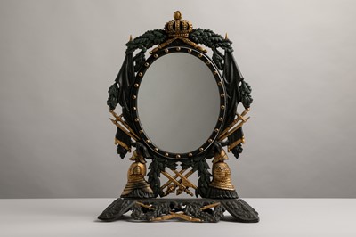 Lot 341 - A patinated and gilt cast iron table mirror