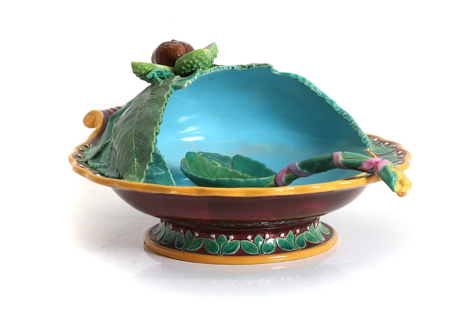Lot 230 - A George Jones majolica chestnut server and spoon