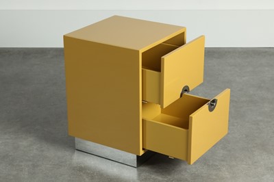 Lot 44 - A mustard lacquered and chrome side cabinet