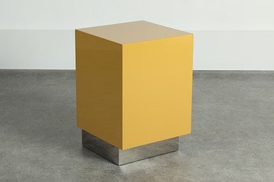 Lot 44 - A mustard lacquered and chrome side cabinet