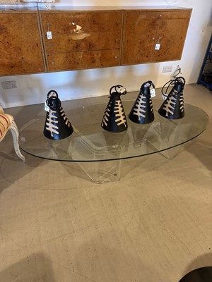 Lot 227 - A Lucite and glass coffee table