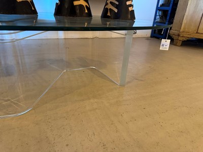 Lot 227 - A Lucite and glass coffee table