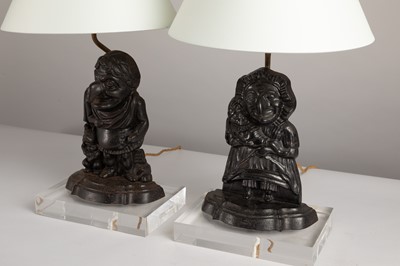Lot 208 - A pair of 'Punch and Judy' door porter table lamps