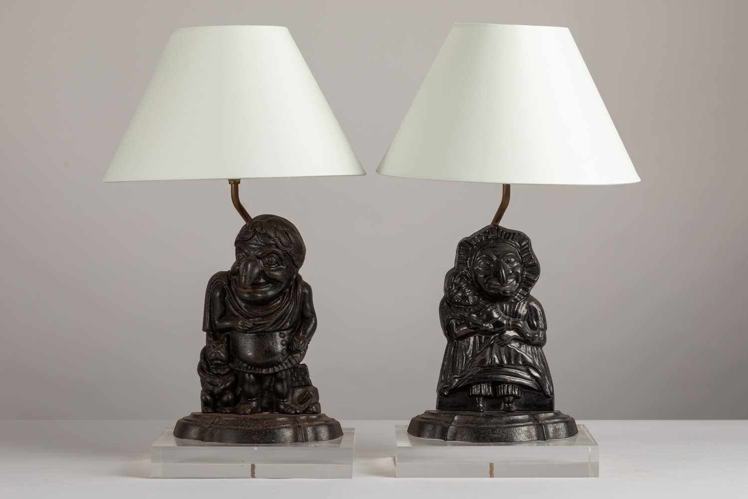 Lot 208 - A pair of 'Punch and Judy' door porter table lamps