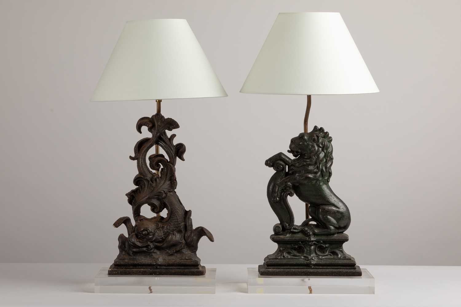 Lot 159 - Two cast iron door-porter table lamps