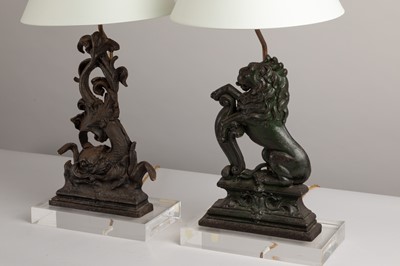 Lot 159 - Two cast iron door-porter table lamps