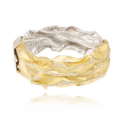Lot 252 - Ken Bolan and Marinette Domon: a two-tone gold diamond 'Touche de Soie' bangle