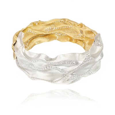 Lot 252 - Ken Bolan and Marinette Domon: a two-tone gold diamond 'Touche de Soie' bangle