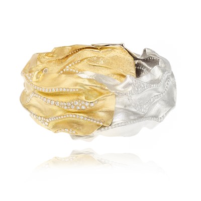 Lot 252 - Ken Bolan and Marinette Domon: a two-tone gold diamond 'Touche de Soie' bangle