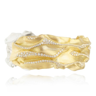 Lot 252 - Ken Bolan and Marinette Domon: a two-tone gold diamond 'Touche de Soie' bangle