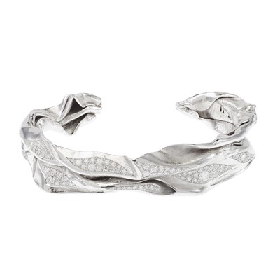 Lot 255 - Ken Bolan and Marinette Domon: a white gold diamond 'Touche de Soie' bangle