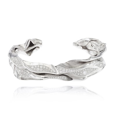 Lot 255 - Ken Bolan and Marinette Domon: a white gold diamond 'Touche de Soie' bangle