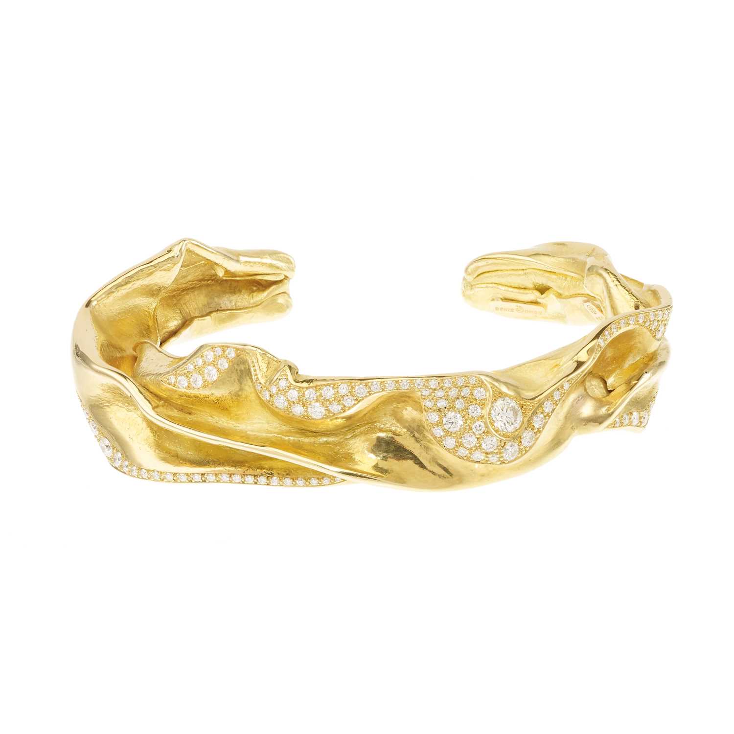 Lot 260 - Ken Bolan and Marinette Domon: a gold diamond 'Touche de Soie' bangle