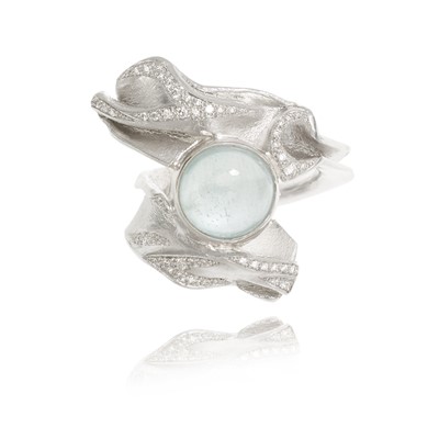 Lot 258 - Ken Bolan and Marinette Domon: a white gold diamond and aquamarine 'Touche de Soie' ring