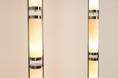 Lot 39 - A pair of chrome and acrylic floor-standing lights