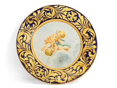 Lot 229 - A majolica style wall charger