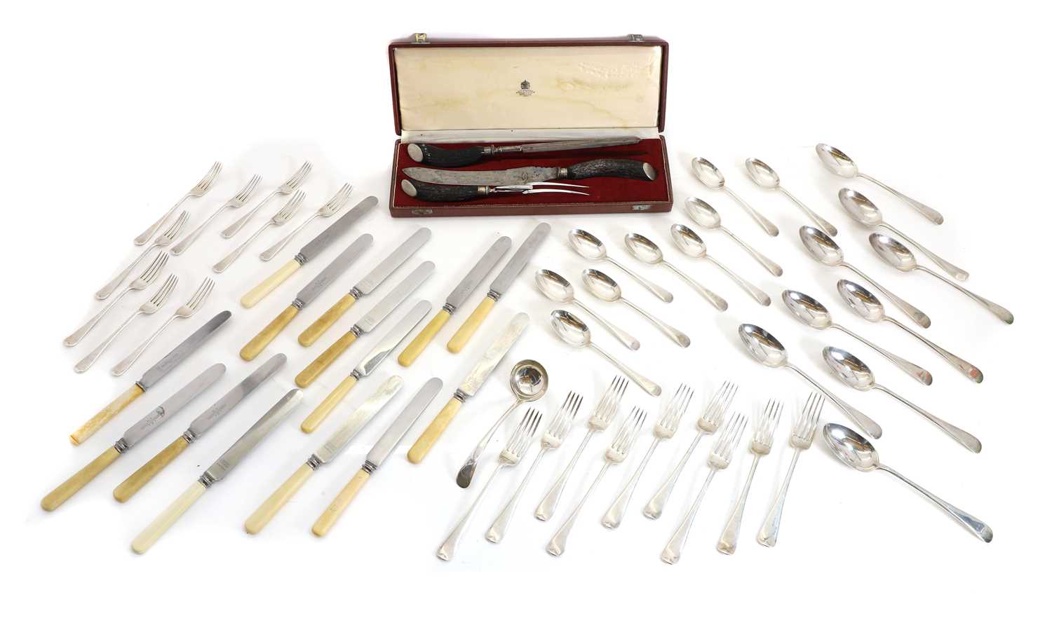 Lot 86 - An Old English pattern silver table service for eight place settings