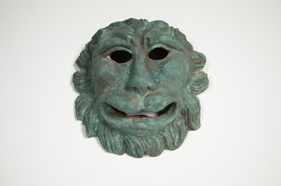 Lot 301 - A painted terracotta lion mask