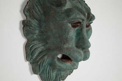 Lot 301 - A painted terracotta lion mask
