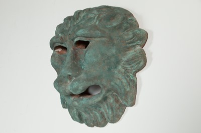 Lot 301 - A painted terracotta lion mask