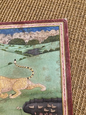 Lot 191 - A large Indian painting of a maharaja on a tiger hunt