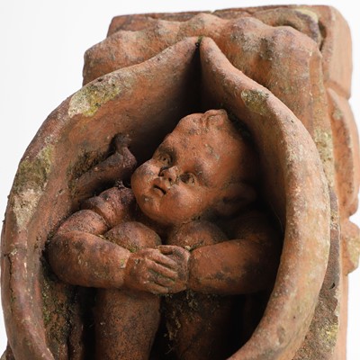 Lot 47 - A terracotta gargoyle attributed to Compton Pottery