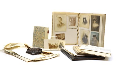 Lot 350 - A photo album of the D'Invernois family
