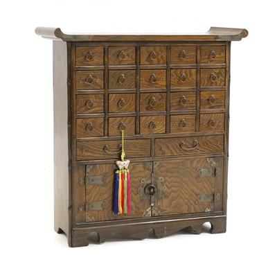 Lot 75 - A Korean elm table top cabinet