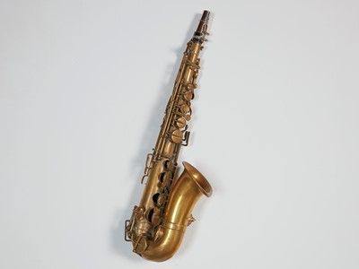 Lot 46 - Five brass and silvered musical instruments