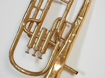 Lot 46 - Five brass and silvered musical instruments