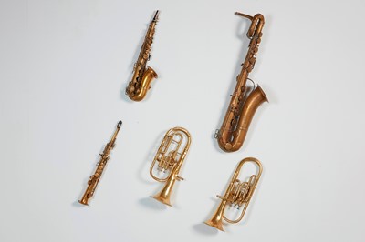 Lot 46 - Five brass and silvered musical instruments