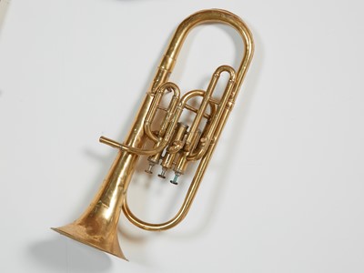 Lot 46 - Five brass and silvered musical instruments