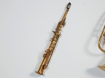 Lot 46 - Five brass and silvered musical instruments