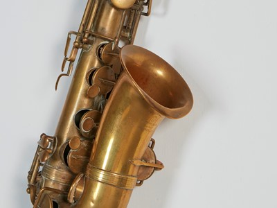 Lot 46 - Five brass and silvered musical instruments