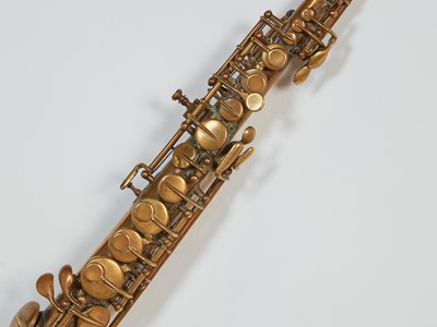 Lot 46 - Five brass and silvered musical instruments