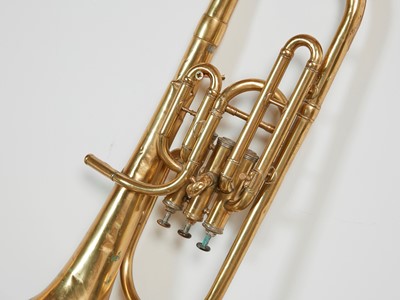 Lot 46 - Five brass and silvered musical instruments