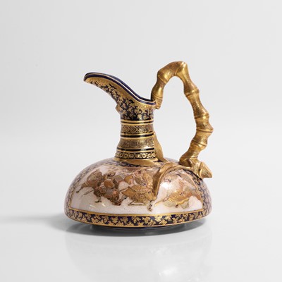 Lot 244 - A Japanese Satsuma ware ewer