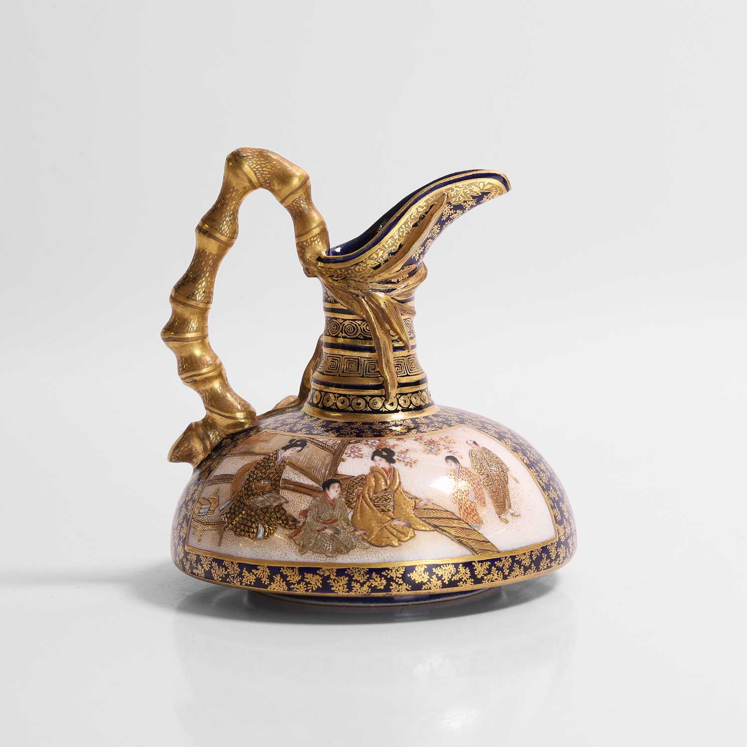 Lot 244 - A Japanese Satsuma ware ewer