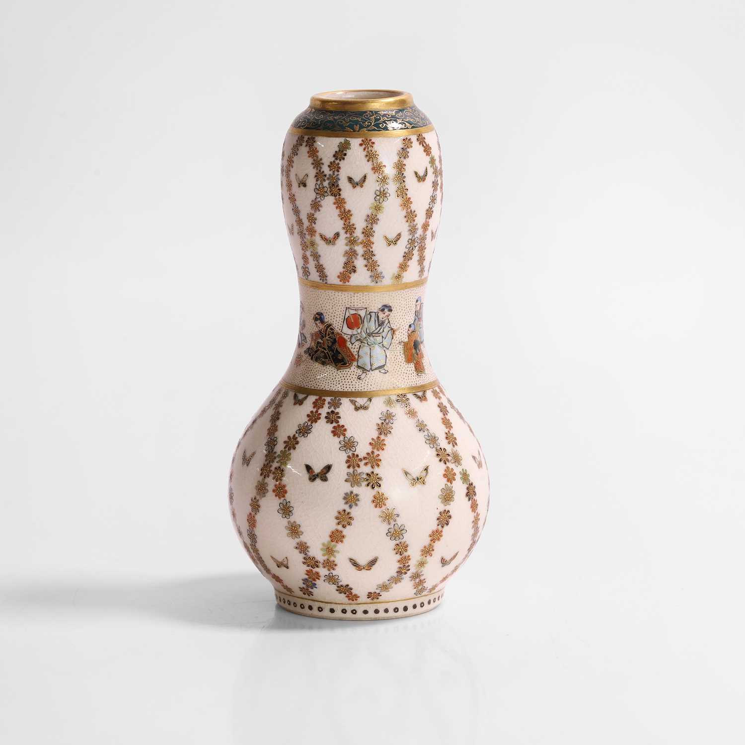 Lot 242 - A Japanese Satsuma ware miniature vase