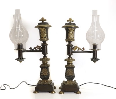 Lot 560 - A pair of bronze and brass Argand lamps