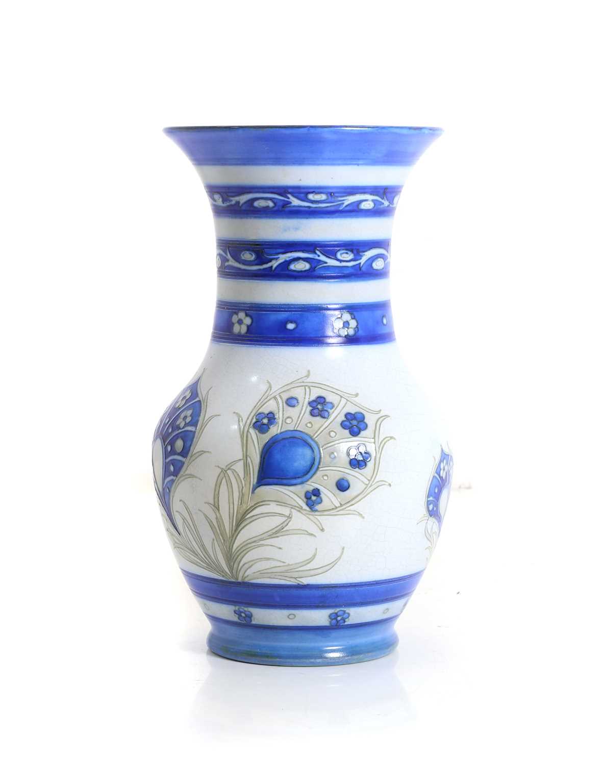 Lot 247 - A Moorcroft 'Peacock Feather' design pottery vase