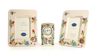 Lot 257 - Two Moorcroft Pottery nursery photograph frames