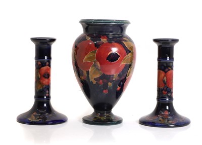 Lot 255 - A William Moorcroft 'Pomegranate' pattern pottery vase