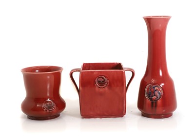 Lot 251 - A Moorcroft red 'Flamminian' twin handled pot