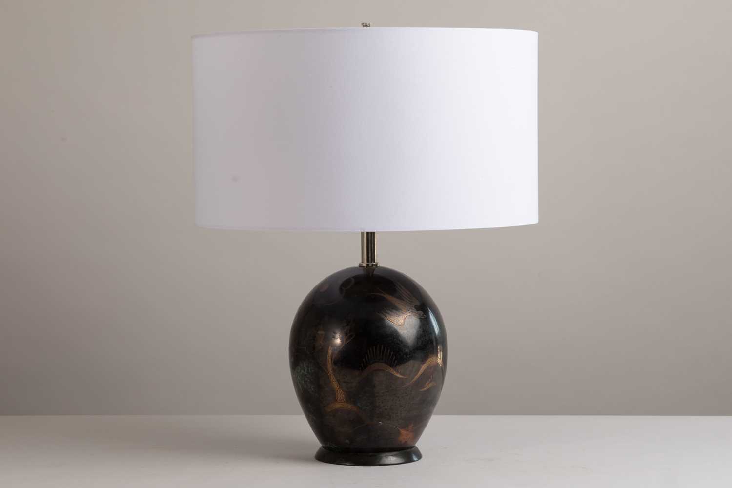 Lot 60 - A dinanderie table lamp