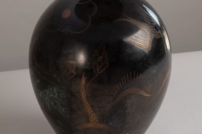 Lot 60 - A dinanderie table lamp